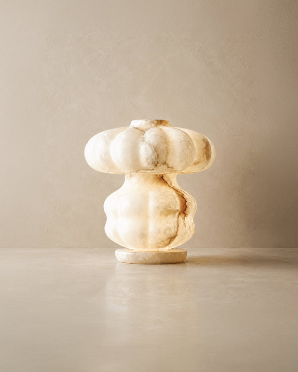 Raaq table lamp casting warm ambient glow